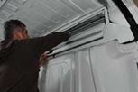 Over-cab storage for high body vans